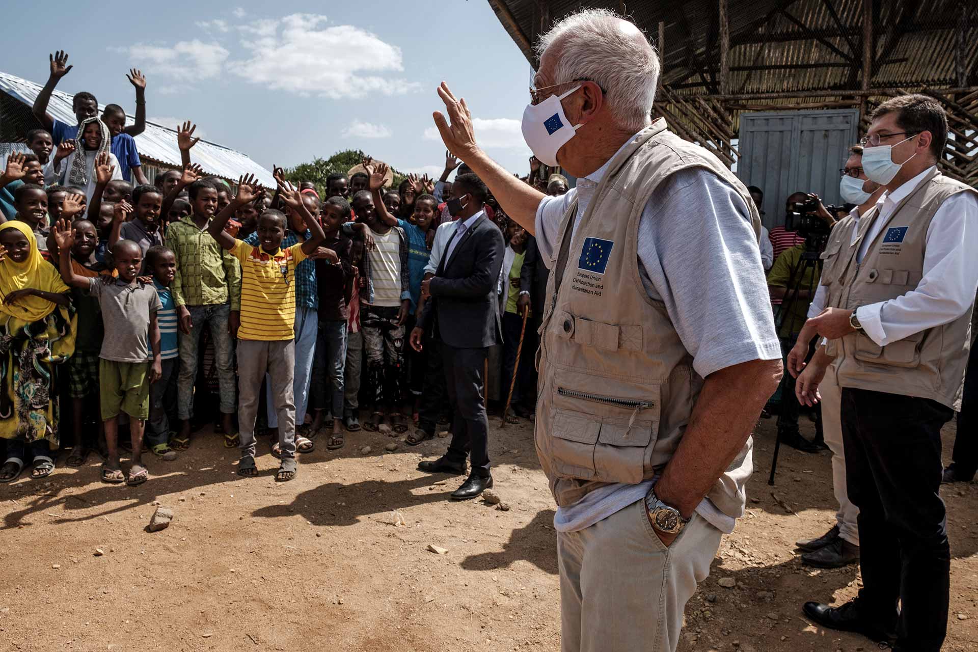josep-borrel-in-the-center-and-janez-lenarcic-on-the-right-greet-the-communities-during-a-visit-to-the-qoloji-camp-for-internally-displaced-people-ethiopia